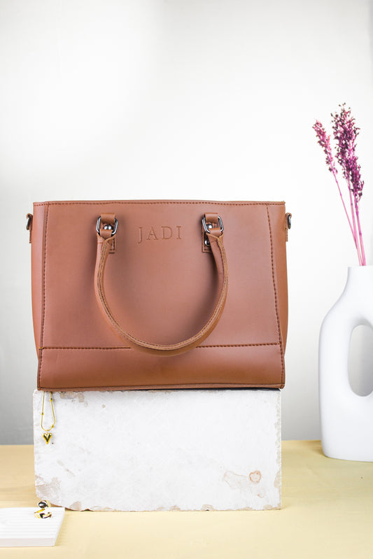 Soléa Handbag in Brown — earthy minimal handbag JADI Pakistan